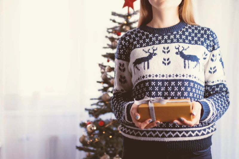 girl hold gift in her arms